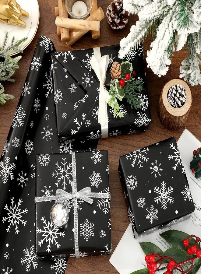 وولاين ورق تغليف هدايا عيد الميلاد من والين - لفة صغيرة - 17 بوصة × 32.8 قدم، ورق تغليف هدايا فني باللونين الأسود والأبيض بنقشة ندفة الثلج الشتوية، مناسب لأعياد الميلاد، وحفلات استقبال المولود، وحفلات الزفاف. - Image 4